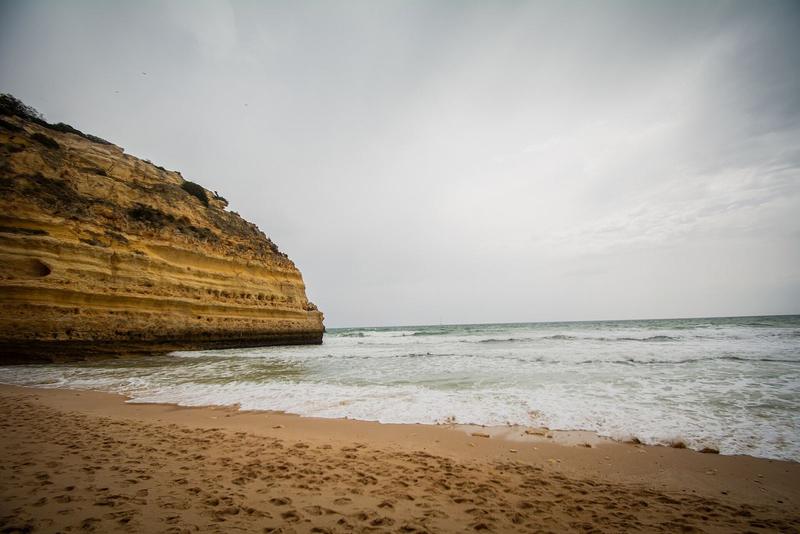 Golden cliffs and turquoise sea at Praia da Marinha, Lagoa