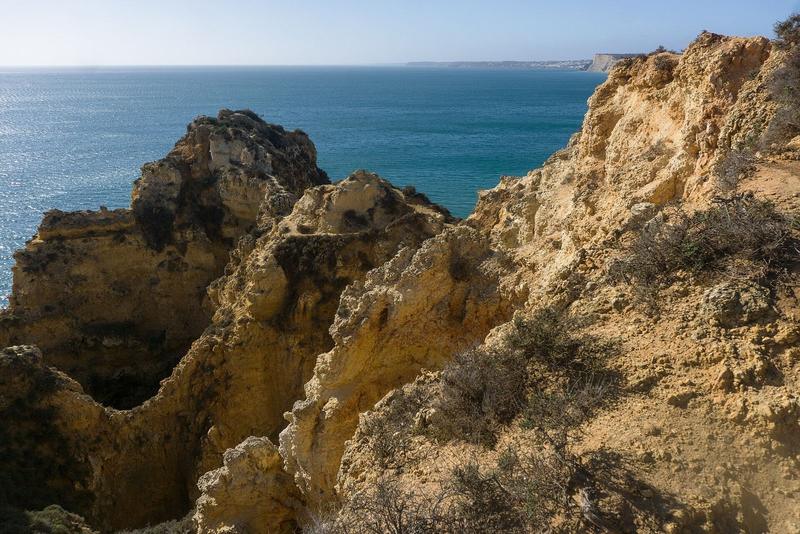 Golden arches and cliffs of Ponta da Piedade, Lagos, in late-afternoon light