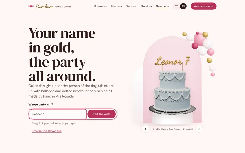 The opening: the name typed in appears on the cake’s gold topper.